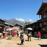 Village Life  Peaceful village life in Baisha village, in the back the snowy peaks of Jade Dragon Snow Mountain.